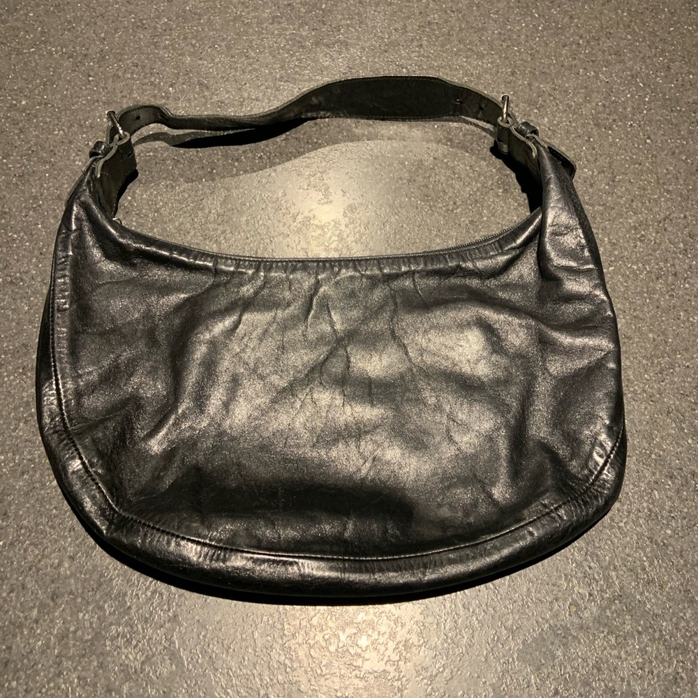 Black leather shoulder bag by RUDSAK